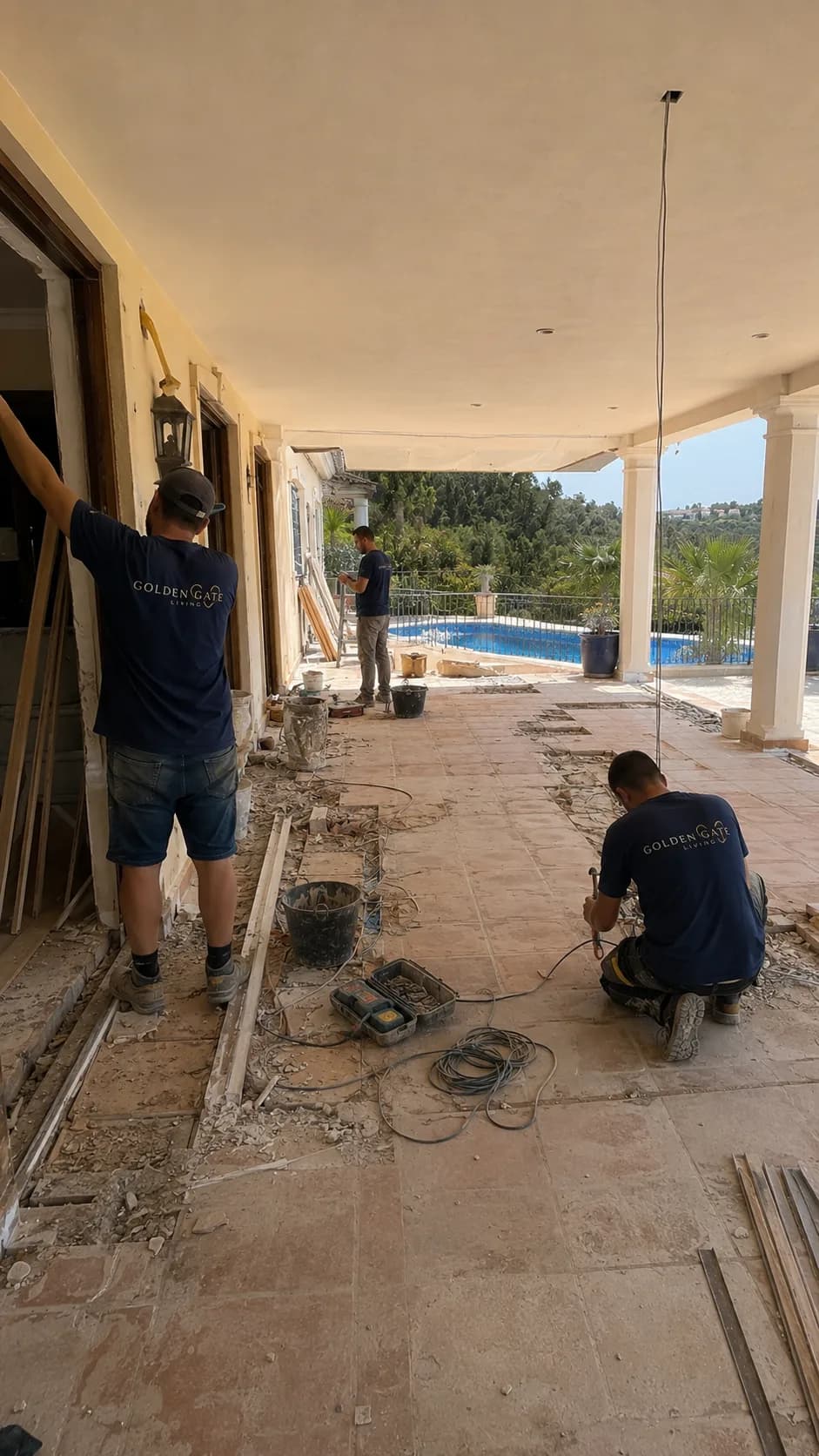 Covered terrace floor works during a luxury villa renovation