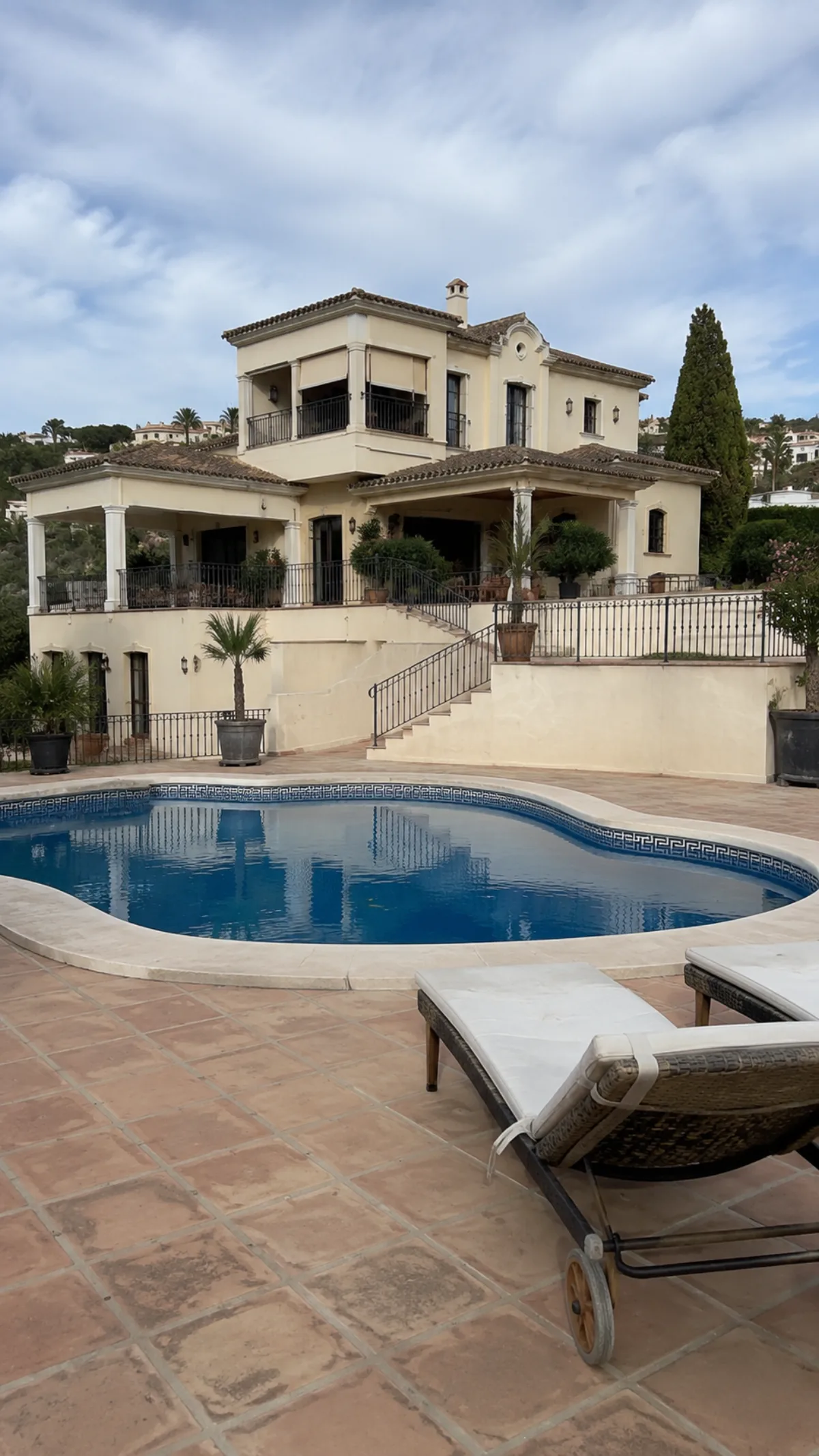 Villa before the reform — original exterior and pool area